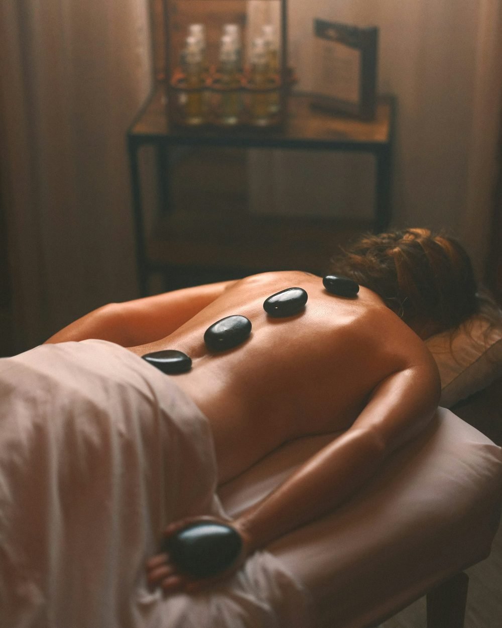 Relaxing hot stone massage treatment